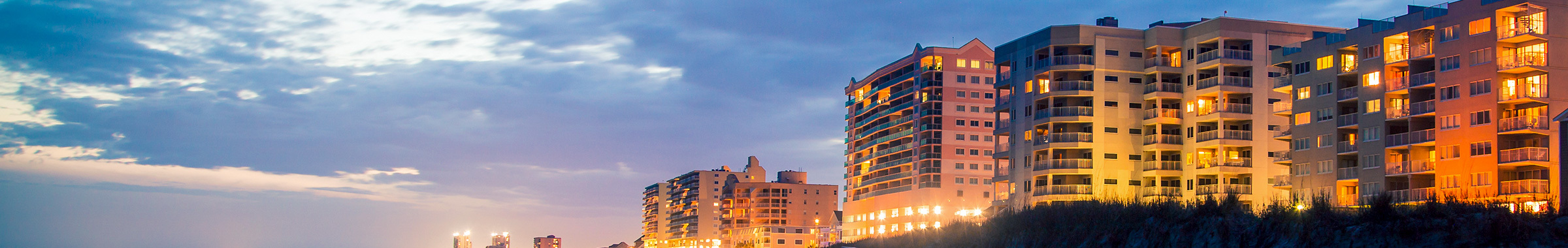 panoramic view of condos on a beach