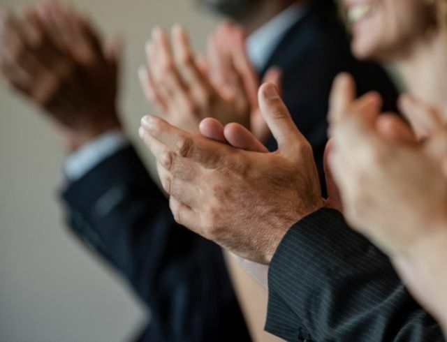 Close-up shot of clapping hands